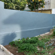 Construção e pintura de muro