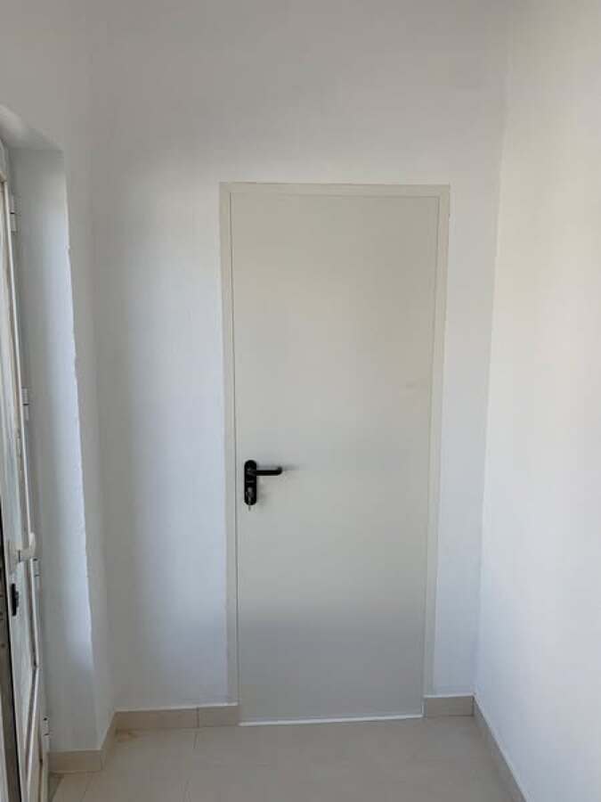 Instalação de porta de acesso para garagem