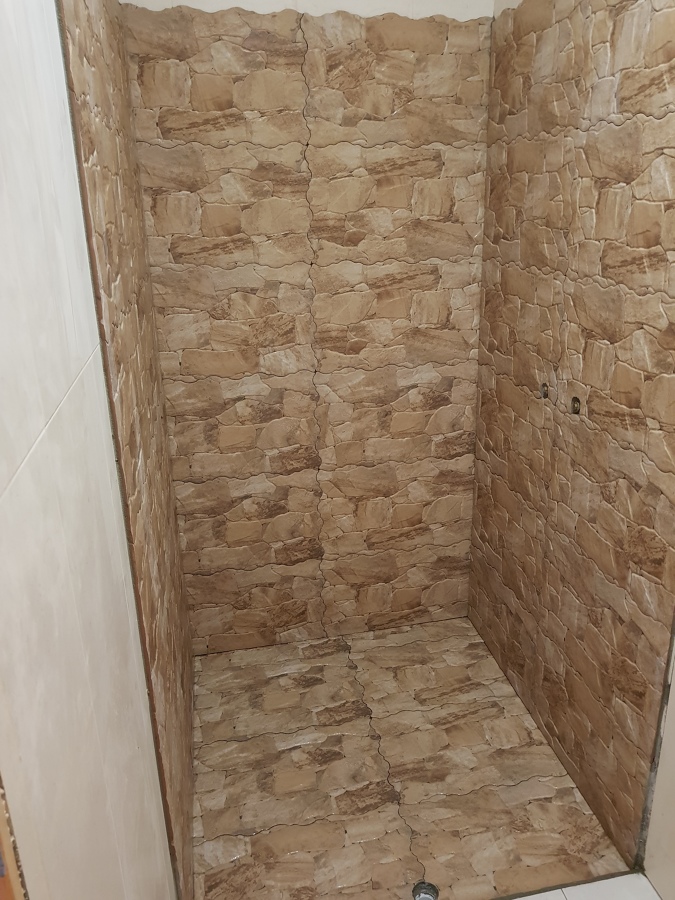 Construção de base de chuveiro