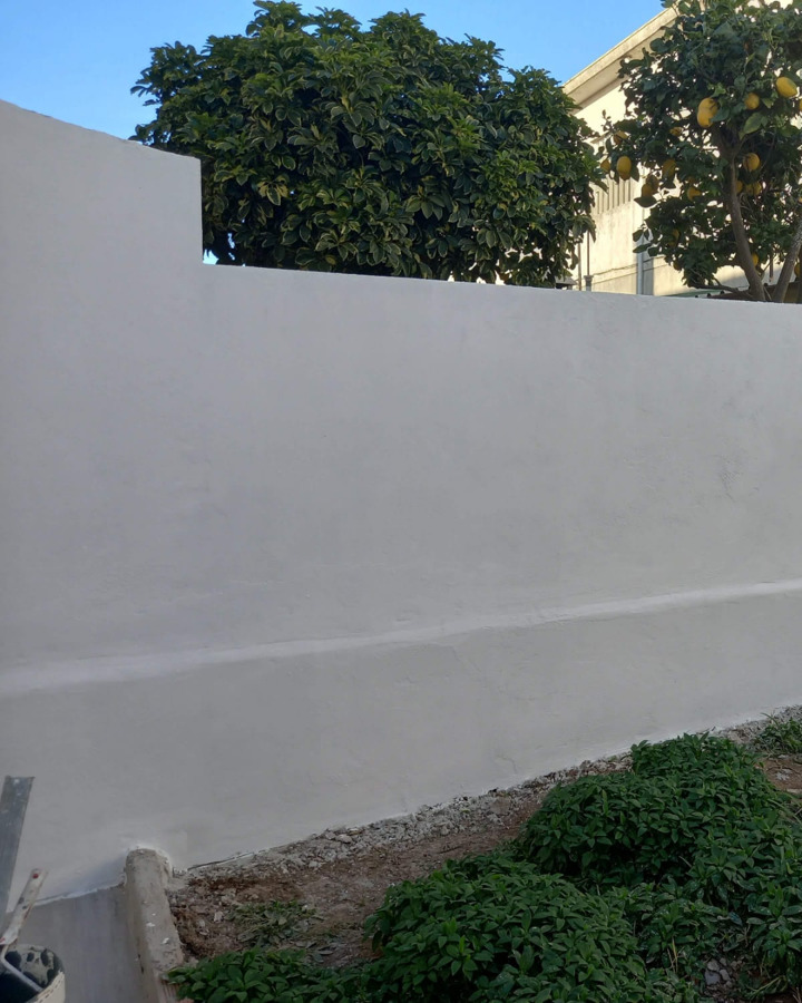 Construção e pintura de muro