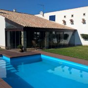 Aproveitamento de telheiro e construção de varanda interior em habitação na zona de Coimbra