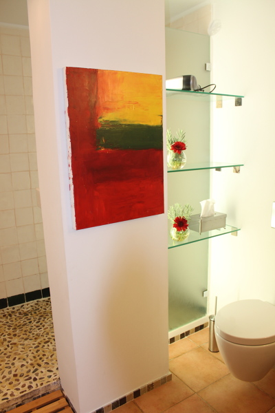 Base de duche feito com pedras da praia