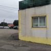 Rebocar e pintar parede exterior danificada