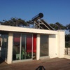 Isolamento térmico de parte da fachada (com infiltrações) impermeabilização de cobertura plana (sem patologias)