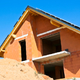 Qual seria o preço para a construção de uma moradia modelar com o projeto incluído?